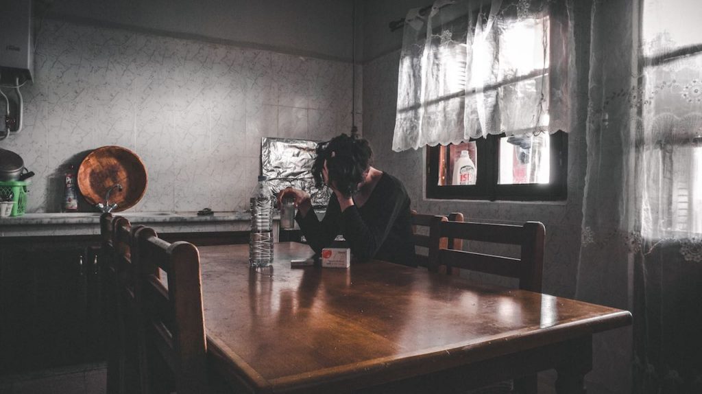 Girl at Table; Depression; Health Collective