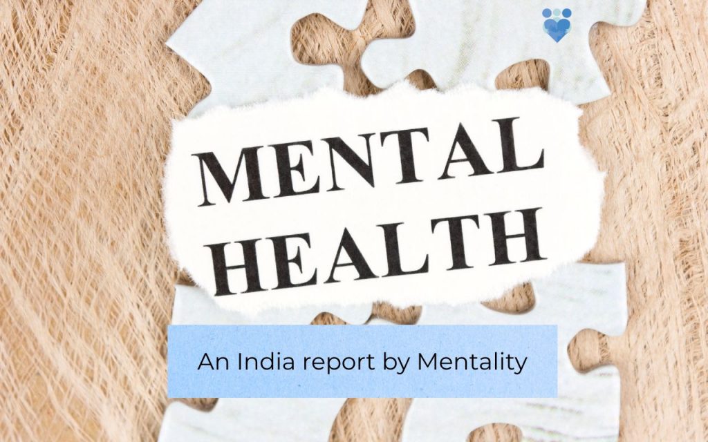 A jigsaw puzzle saying Mental Health with a Health Collective logo and text that says an India story by Mentality